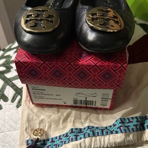 Tory Burch Black Flats with Gold Emblem